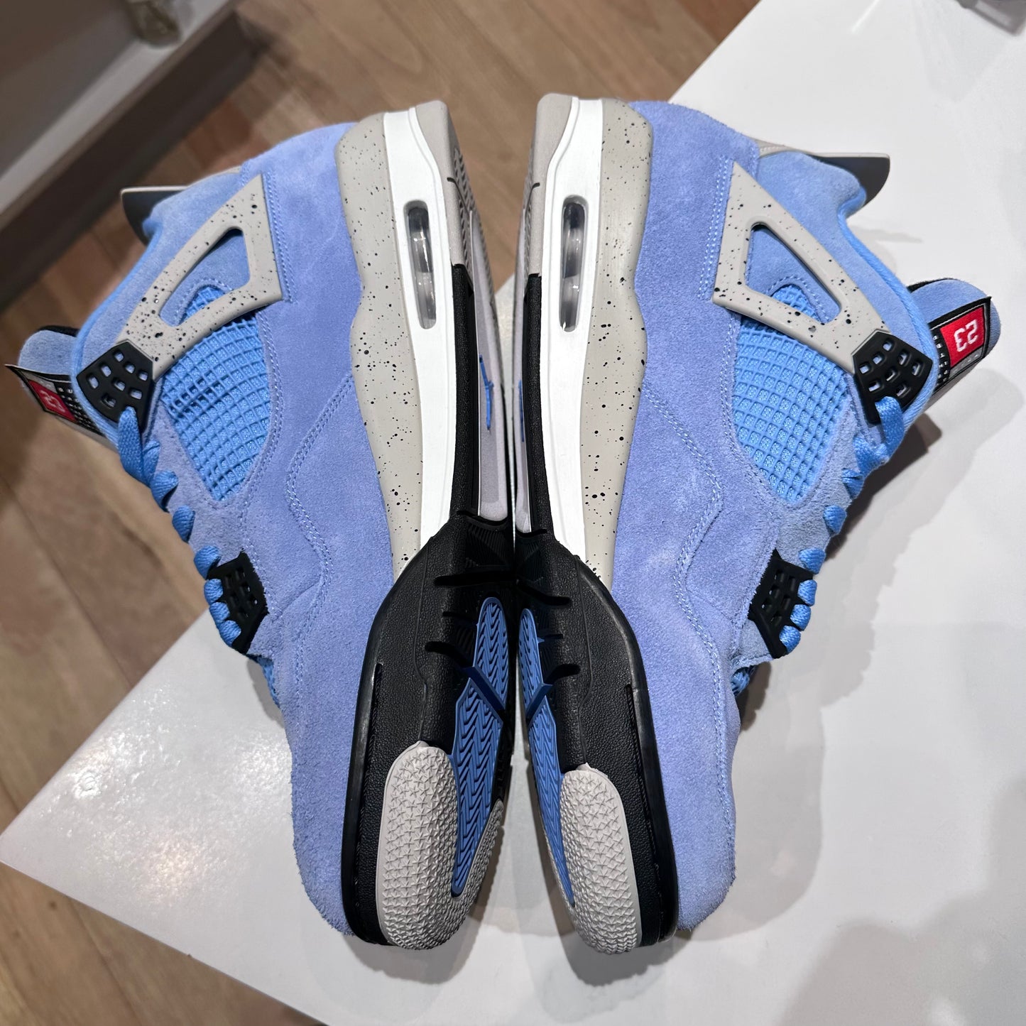 Jordan 4 Retro University Blue Pre-Owned